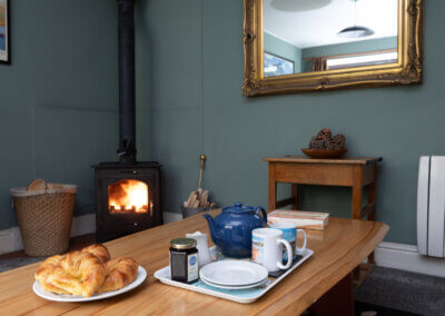 Woodburning stove and tea tray, Snowdonia holiday cottage